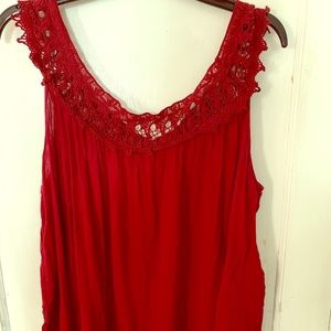 Red tank top with lace detail.